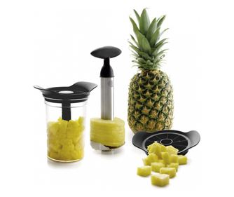 Уред за почистване и рязане на ананас с контейнер