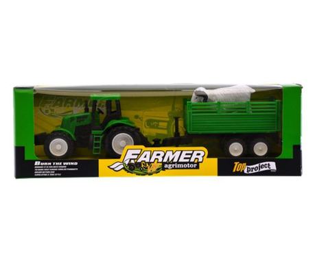 Traktor utánfutóval tehénnel